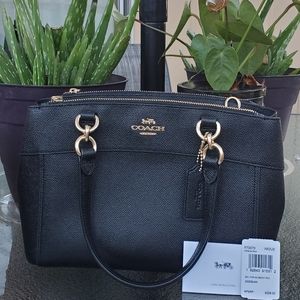 Coach™️ Black leather crossbody purse